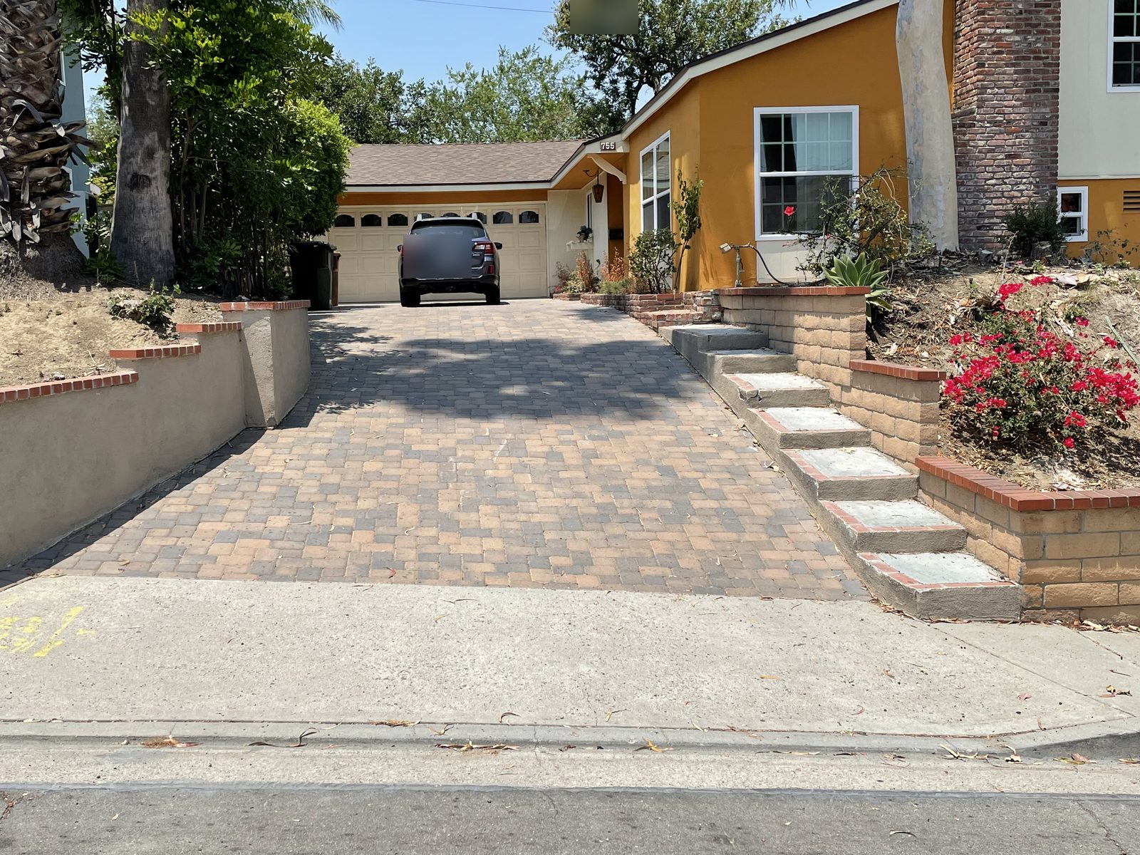 New concrete driveway by Driveway Masters in Fullerton, CA