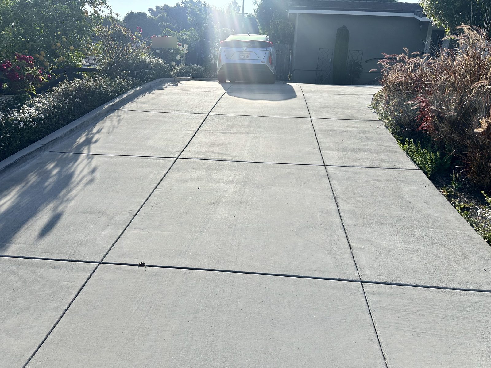 New concrete driveway by Driveway Masters in Fullerton, CA