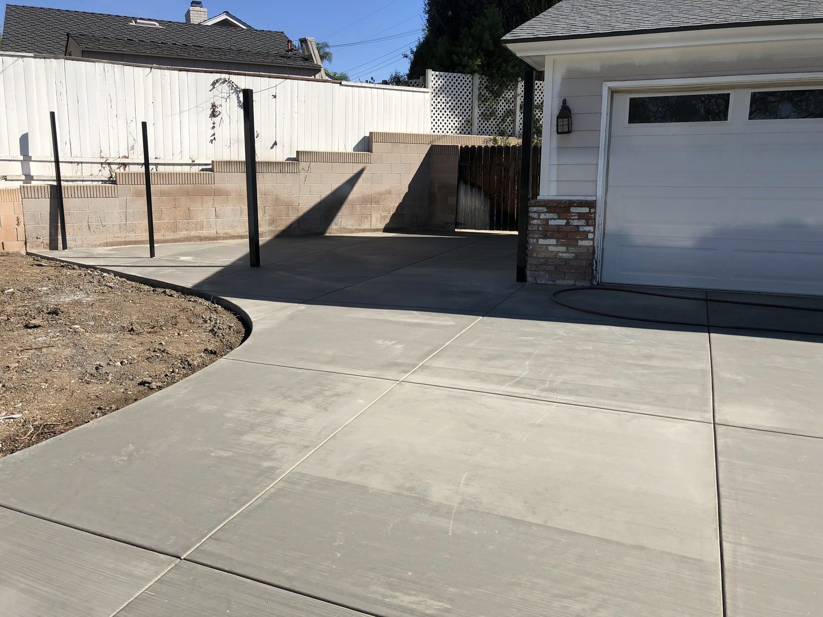 New concrete driveway by Driveway Masters in Santa Ana, CA
