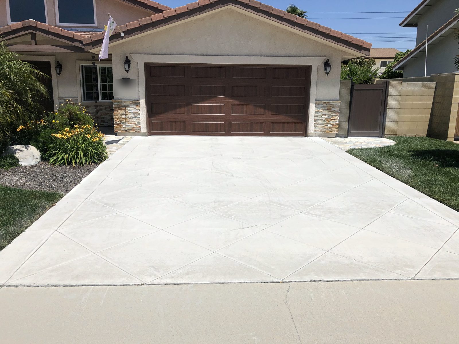 New concrete driveway by Driveway Masters in Westminster, CA