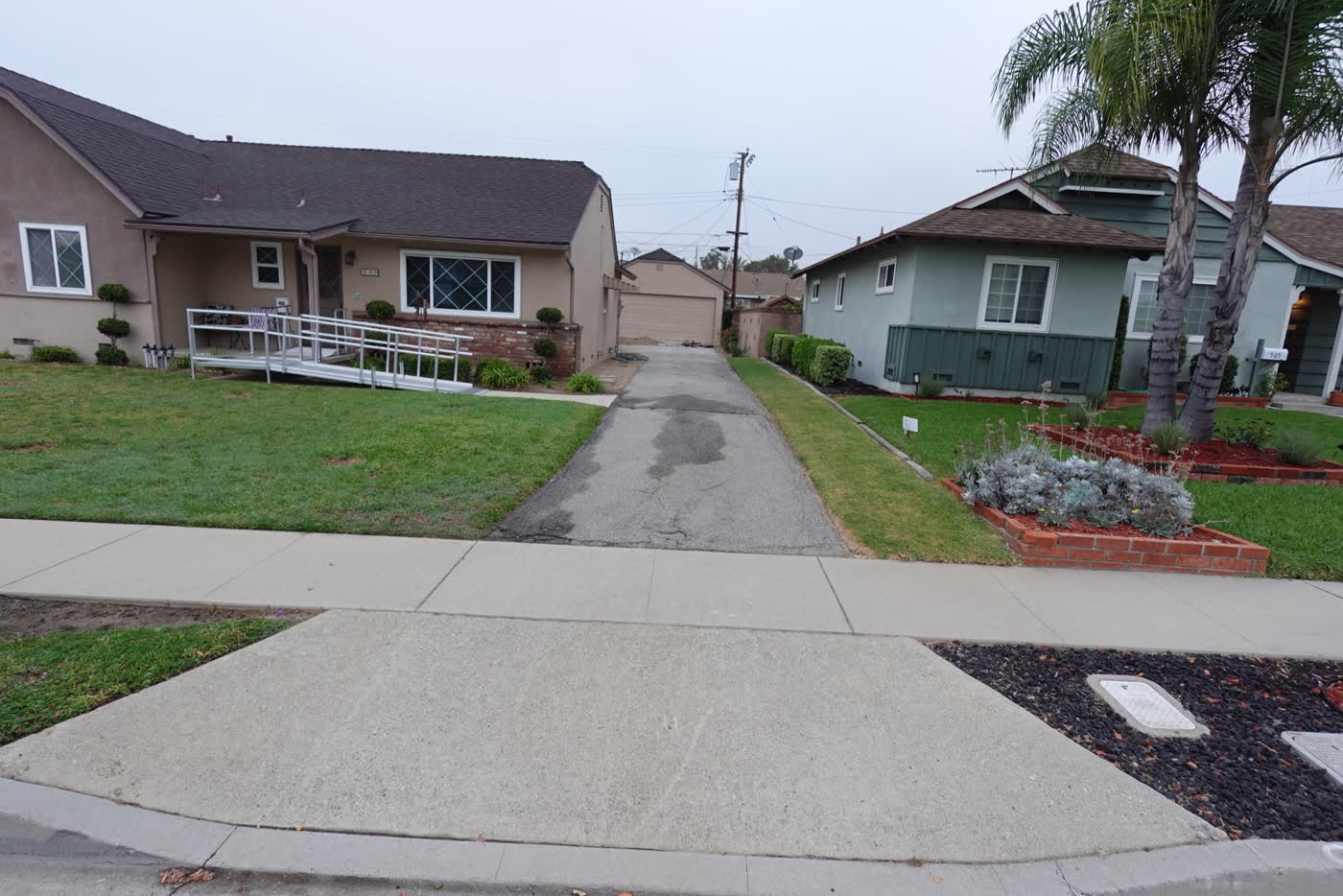 Old asphalt driveway in Covina before replacement