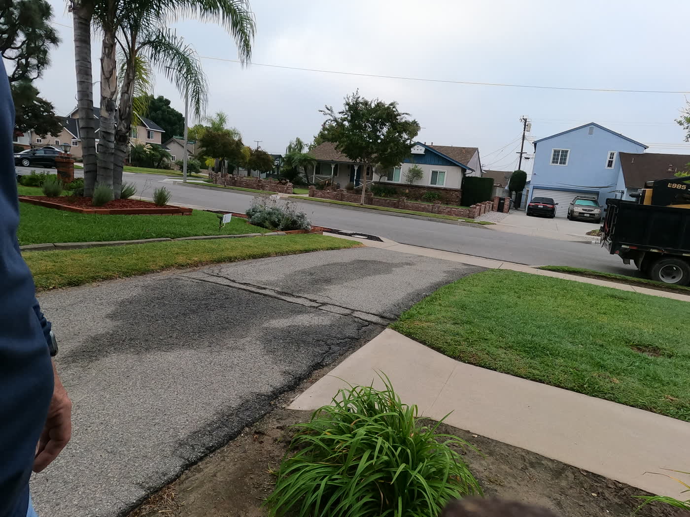 Close look at the worn asphalt at the street